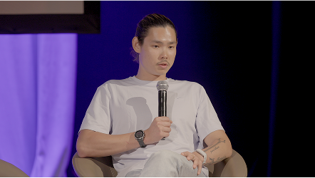 Se-Bom Lee (Olympian) talking to the audience at Healthia Impact 2024