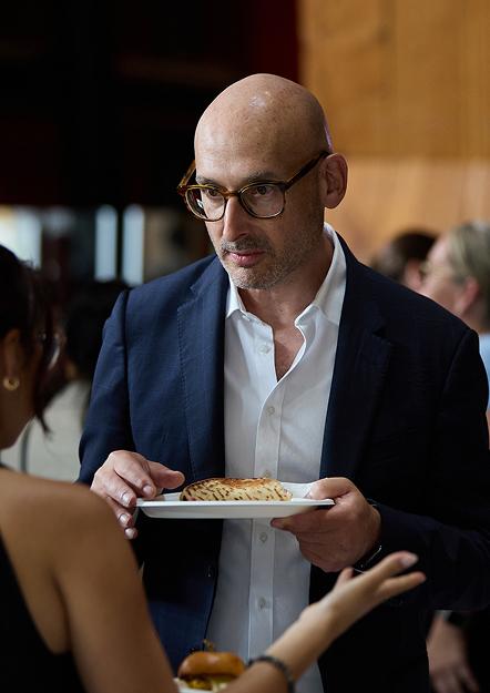 Professor Tony Goldschlager (Neurosurgeon) eating at the event